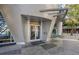 Modern building entrance with reflective glass and decorative metal accents at 3338 Peachtree Ne Rd # 3406, Atlanta, GA 30326