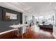 Stylish condo featuring hardwood floors, modern lighting, and dining area with city views at 3338 Peachtree Ne Rd # 3406, Atlanta, GA 30326
