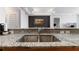 Kitchen sink featuring stainless steel sink, granite countertops and view to dining and main bedroom at 3338 Peachtree Ne Rd # 3406, Atlanta, GA 30326
