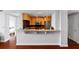 Modern kitchen with stainless steel appliances, granite countertops, and breakfast bar at 3338 Peachtree Ne Rd # 3406, Atlanta, GA 30326