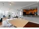 Open floorplan with kitchen bar, dining area, and living room featuring city views at 3338 Peachtree Ne Rd # 3406, Atlanta, GA 30326