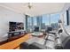 Inviting living room featuring large windows, comfortable seating, and modern decor for a stylish space at 3338 Peachtree Ne Rd # 3406, Atlanta, GA 30326