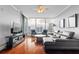 Open-concept living area features large windows with cityscape views and stylish modern furnishings at 3338 Peachtree Ne Rd # 3406, Atlanta, GA 30326