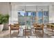Bright lounge area with comfortable seating, a table, and floor to ceiling windows showcasing the cityscape at 3338 Peachtree Ne Rd # 3406, Atlanta, GA 30326