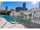Outdoor pool with lounge chairs on the deck and an adjacent building with many windows at 3338 Peachtree Ne Rd # 3406, Atlanta, GA 30326