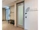 Hallway to Spa Services with doors, bench and textured walls at 3338 Peachtree Ne Rd # 3406, Atlanta, GA 30326