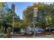 Buckhead Transit Station with MARTA sign amid lush greenery and Atlanta skyline at 3338 Peachtree Ne Rd # 3406, Atlanta, GA 30326