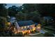 Aerial view of a well-lit and landscaped property with mature trees and a spacious yard at 3912 Edenton Ne Ct, Brookhaven, GA 30319