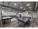 Spacious finished basement with ping pong table, office area, and comfortable seating space at 3912 Edenton Ne Ct, Brookhaven, GA 30319