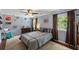 Bedroom featuring neutral walls, carpet flooring, and planet wall decor at 3912 Edenton Ne Ct, Brookhaven, GA 30319