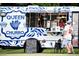 The Queen Churro food truck serving churros and beverages with a creative, colorful design at 3912 Edenton Ne Ct, Brookhaven, GA 30319