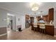 Spacious kitchen with stainless steel appliances, a center island with seating, and access to the laundry room at 3912 Edenton Ne Ct, Brookhaven, GA 30319