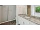Bathroom featuring white vanity, granite counter, framed shower and upgraded fixtures at 3935 Hamilton View Way, Dacula, GA 30019