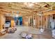 Spacious unfinished basement with insulation and wooden framework for future customization at 1740 Ambercrest Pl, Buford, GA 30518