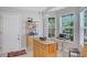 Bright breakfast nook featuring natural lighting and an island at 1740 Ambercrest Pl, Buford, GA 30518