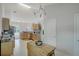 Spacious eat-in kitchen with natural wood cabinets and center island at 1740 Ambercrest Pl, Buford, GA 30518