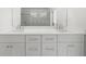 Stylish bathroom vanity with double sinks and a large mirror at 205 Carrington Pt, Canton, GA 30115