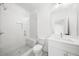 Bathroom features a white vanity, a large shower, and tile floor at 205 Carrington Pt, Canton, GA 30115