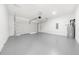 Spacious two-car garage with epoxy flooring at 205 Carrington Pt, Canton, GA 30115