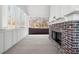 Back porch featuring brick fireplace and white siding at 205 Carrington Pt, Canton, GA 30115