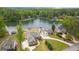 Aerial view showcasing the houses near the lake at 2191 Lakeview Pkwy, Villa Rica, GA 30180