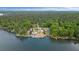 Beautiful aerial view of lakefront homes with private boat docks on a sunny day at 2191 Lakeview Pkwy, Villa Rica, GA 30180
