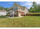 Spacious backyard with multi-level deck and patio of the house at 2191 Lakeview Pkwy, Villa Rica, GA 30180