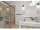 Bathroom featuring a tiled shower with a glass door and a granite vanity at 2191 Lakeview Pkwy, Villa Rica, GA 30180