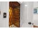 Home elevator with wood trim and metal accordion style door at 2191 Lakeview Pkwy, Villa Rica, GA 30180