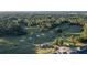 Scenic aerial view of the golf course surrounded by lush green trees at 2191 Lakeview Pkwy, Villa Rica, GA 30180