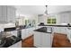 Bright kitchen featuring white cabinets and dark granite countertops at 2191 Lakeview Pkwy, Villa Rica, GA 30180