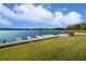 Expansive lake view featuring docks and a lush green shoreline on a sunny day at 2191 Lakeview Pkwy, Villa Rica, GA 30180