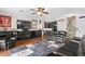 Living room with a large couch, entertainment center and wet bar at 2191 Lakeview Pkwy, Villa Rica, GA 30180