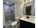 Updated bathroom with a stylish shower and modern vanity at 2833 Oldknow Nw Dr, Atlanta, GA 30318
