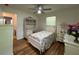 Bright bedroom with hardwood floors, a desk, and ample natural light at 2833 Oldknow Nw Dr, Atlanta, GA 30318