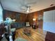 Cozy living room featuring wood paneling, stylish decor, and hardwood floors at 2833 Oldknow Nw Dr, Atlanta, GA 30318