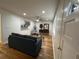 Comfortable living room with hardwood floors, stylish decor, and ample natural light at 2833 Oldknow Nw Dr, Atlanta, GA 30318