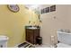 Bathroom featuring a single sink vanity with a dark wood cabinet and framed mirror at 31 Fairview Oak Cv, Dallas, GA 30157