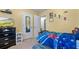 Comfortable bedroom with yellow walls, TV and adjacent door access at 31 Fairview Oak Cv, Dallas, GA 30157