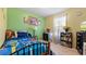 Cozy bedroom with bright green walls, teddy bears, and ample natural light at 31 Fairview Oak Cv, Dallas, GA 30157