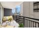 Inviting balcony with seating area offering city views and fresh air at 620 Peachtree Ne St # 601, Atlanta, GA 30308