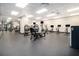 Modern gym equipped with weight machines, treadmills, stationary bikes and multiple televisions at 620 Peachtree Ne St # 601, Atlanta, GA 30308