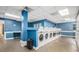 Spacious laundry room featuring multiple rows of energy-efficient washers and dryers for residents' convenience at 620 Peachtree Ne St # 601, Atlanta, GA 30308