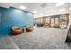 Bright lobby area features a sitting area with modern furniture and beautiful views at 620 Peachtree Ne St # 601, Atlanta, GA 30308