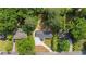 An aerial view of the property showing the landscaping and proximity to surrounding homes at 6835 Sunny Brook Ln, Atlanta, GA 30328