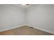 Unfurnished bedroom with wood-look floors, base trim, and a ceiling fan, ready for personalization at 6835 Sunny Brook Ln, Atlanta, GA 30328