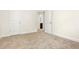 This bedroom has neutral carpet and doors leading to other rooms at 11130 Benton Woods Dr, Covington, GA 30014