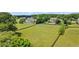 Expansive property with a well-maintained lawn and fenced perimeter at 3920 Ineal Dr, Cumming, GA 30028