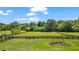 Expansive, well-maintained backyard featuring lush green grass and a classic black fence at 3920 Ineal Dr, Cumming, GA 30028