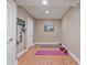 Basement room with workout mats, wall art, and exercise equipment at 3920 Ineal Dr, Cumming, GA 30028